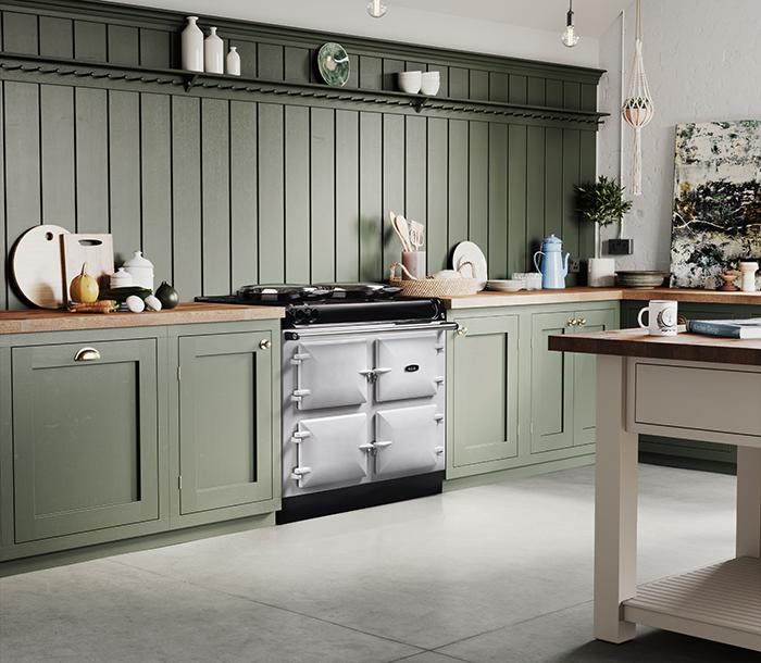 AGA R3 Series 100-4h in White in a kitchen with green cabinetry and panels